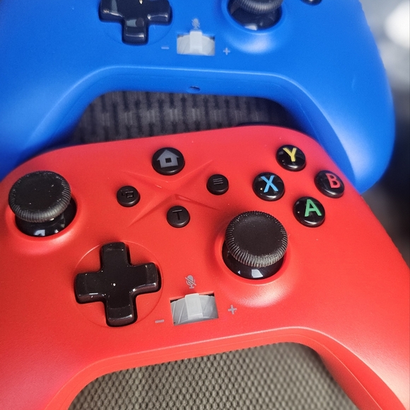 Vibrant Red and Blue Gaming Controllers - Picture 4 of 16